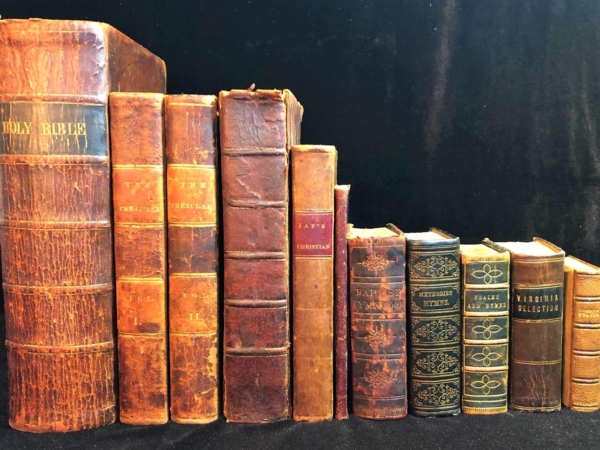 Stock photo of old books and Bible.