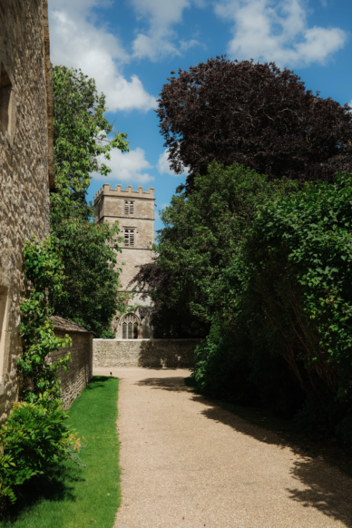 Walk way towards 12th century parish church at Yarnton manor.