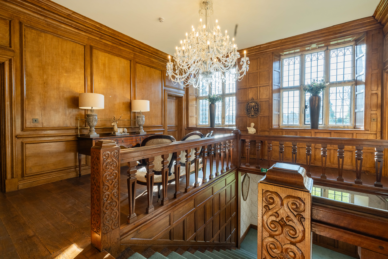 Staircase and chandelier at Yarnton Manor.