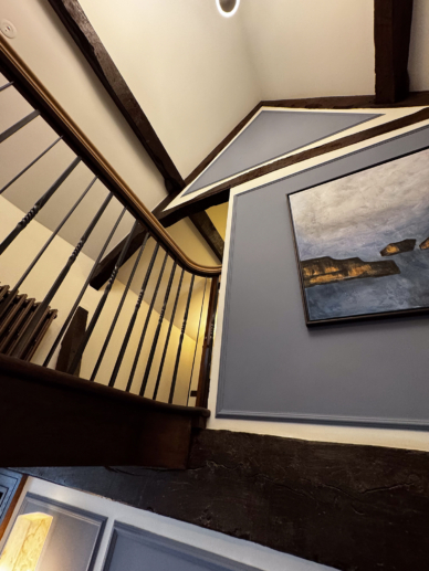 Third floor staircase in Yarnton library tithe barn.